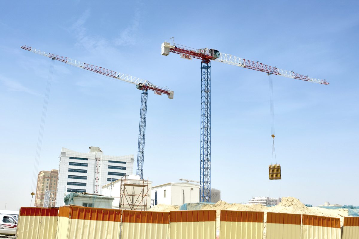 Raimondi Middle East installs two MRT111 flattop tower cranes at a Fujairah National Construction Company jobsite in Dubai