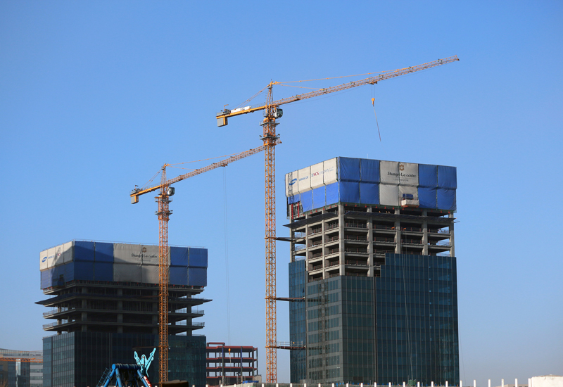 Reaching over: A GCC focus on tower cranes