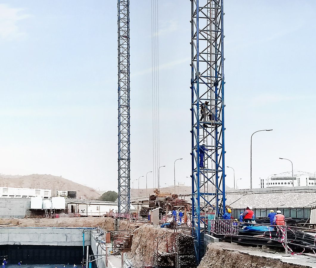 Al Akkad National Projects erects two Raimondi MRT111 topless tower cranes at Al Khaiat Building project