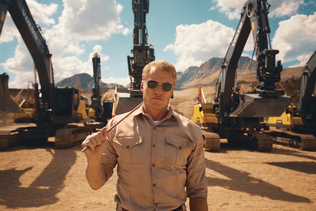 "Rise and shine maggots. I'm here to pump you up," says action hero Dolph Lundgren as he gives Volvo excavators the bootcamp treatment