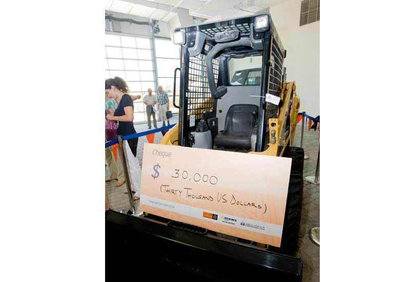 Charity skid-steer fetches record price