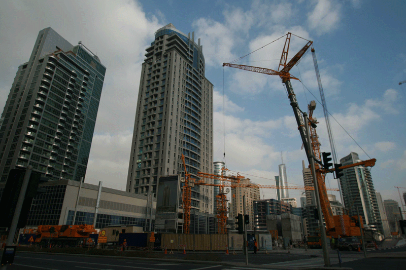 Steady hand brings crane down near glass