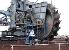 Balancing act as a bucket wheel excavator is moved down under